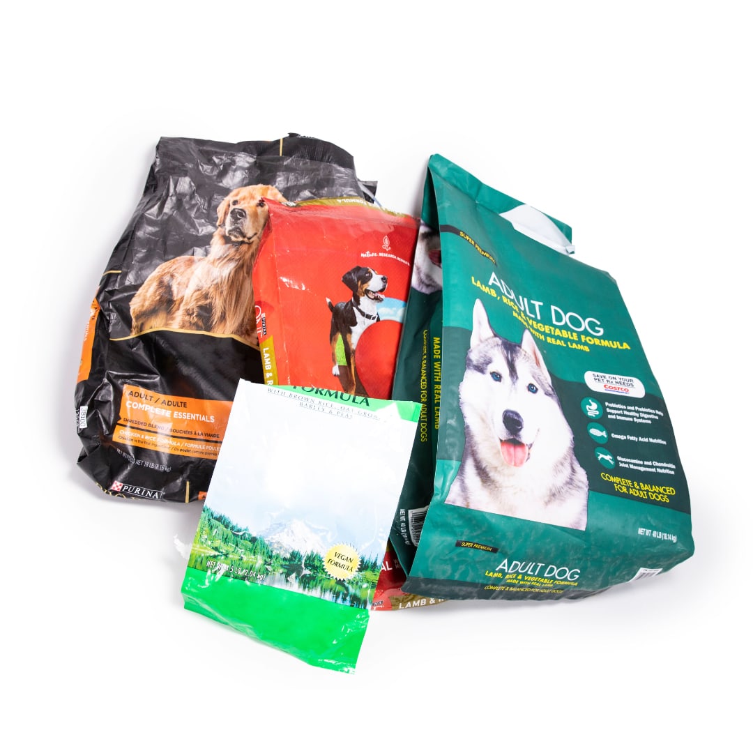 Pet Food Packaging a pile of Pet Food Packaging that can be recycled
